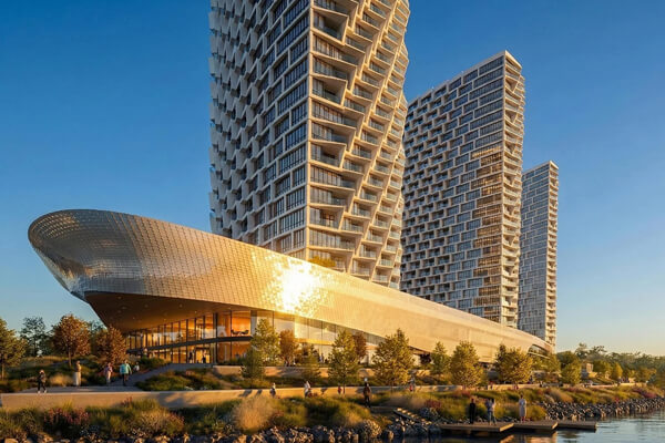 DNIPRO TOWERS — концепция высотного комплекса в Киеве: золотистый фасад, выходящий к воде