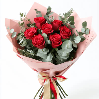 7 червоних троянд в упаковці